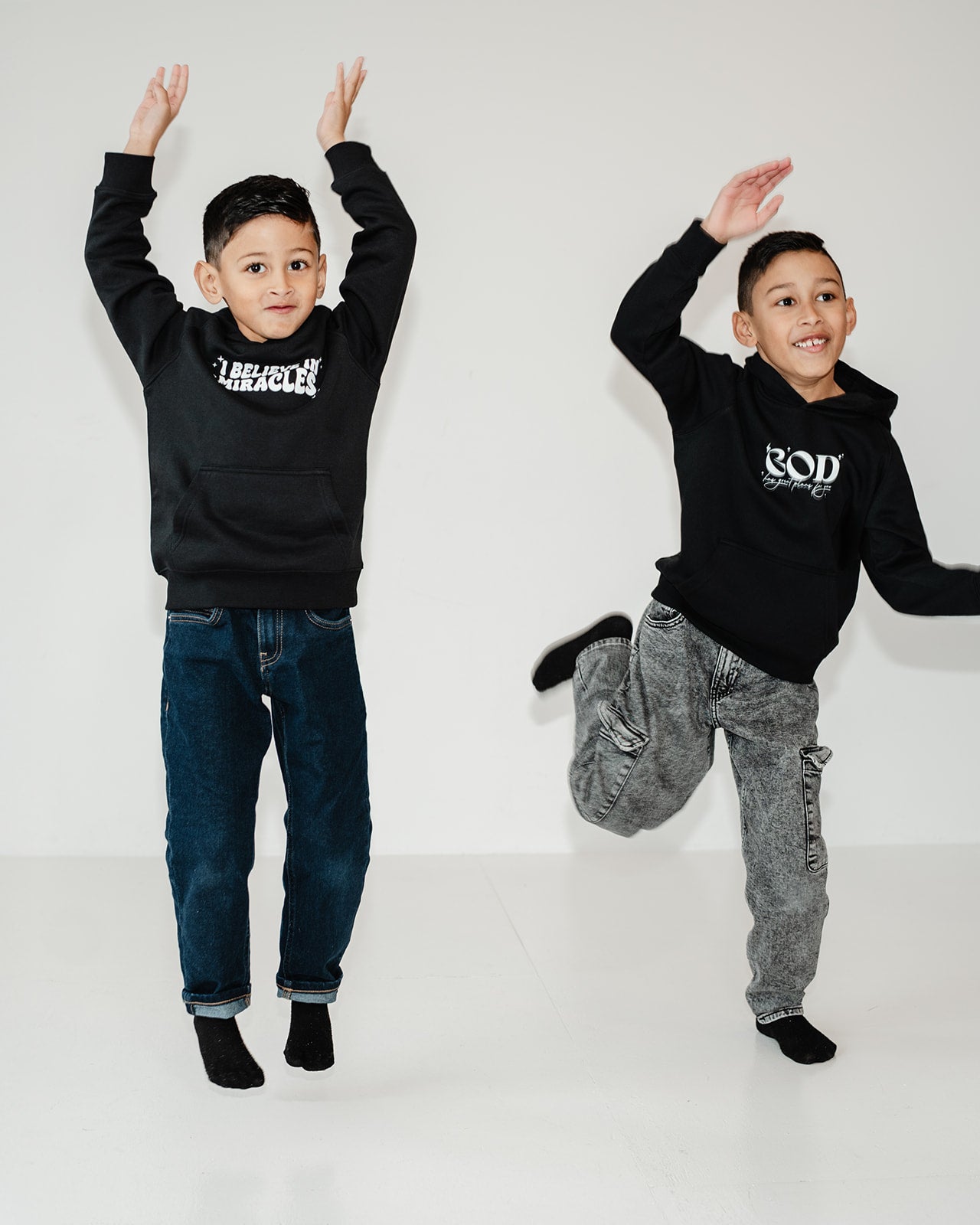 I believe in Miracles Kids Eco Hoodie Black